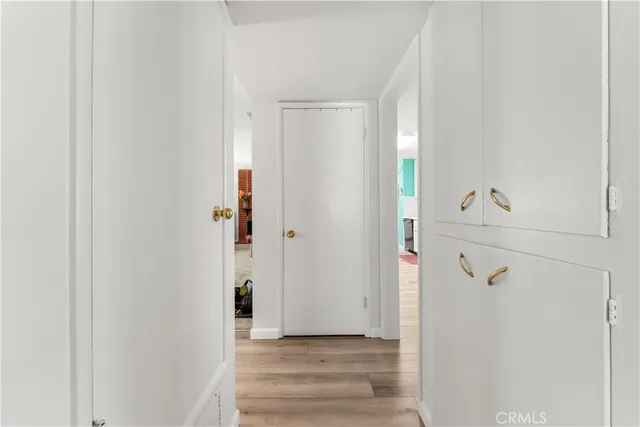 a view of a livingroom with wooden floor