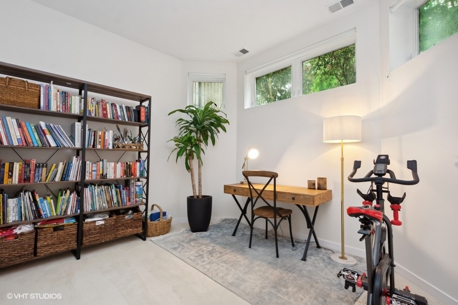 844 East 45th Street Chicago, IL 60653 - Photo 11 of 26 a view of a workspace with furniture and toys