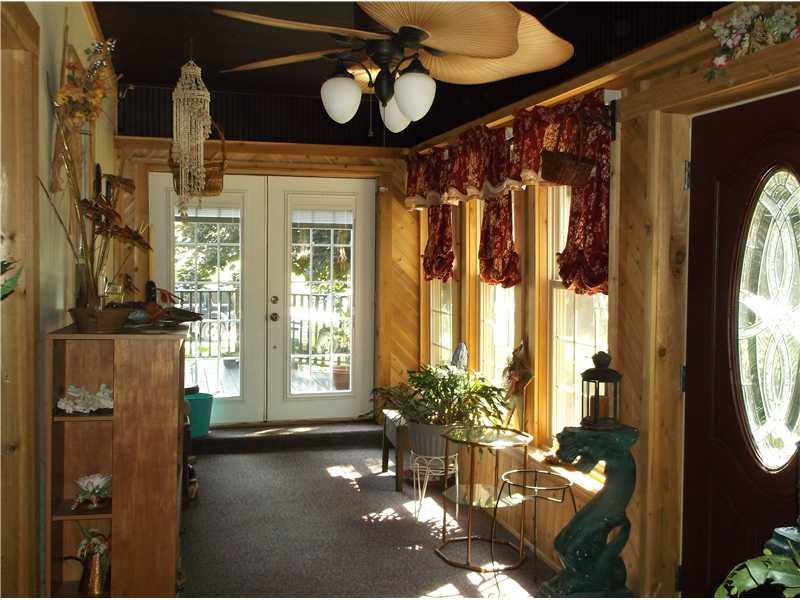 271 Strope Road Aleppo, PA 15310 - Photo 9 of 25 Sunroom. The enclosed sunroom is so warm and inviting!