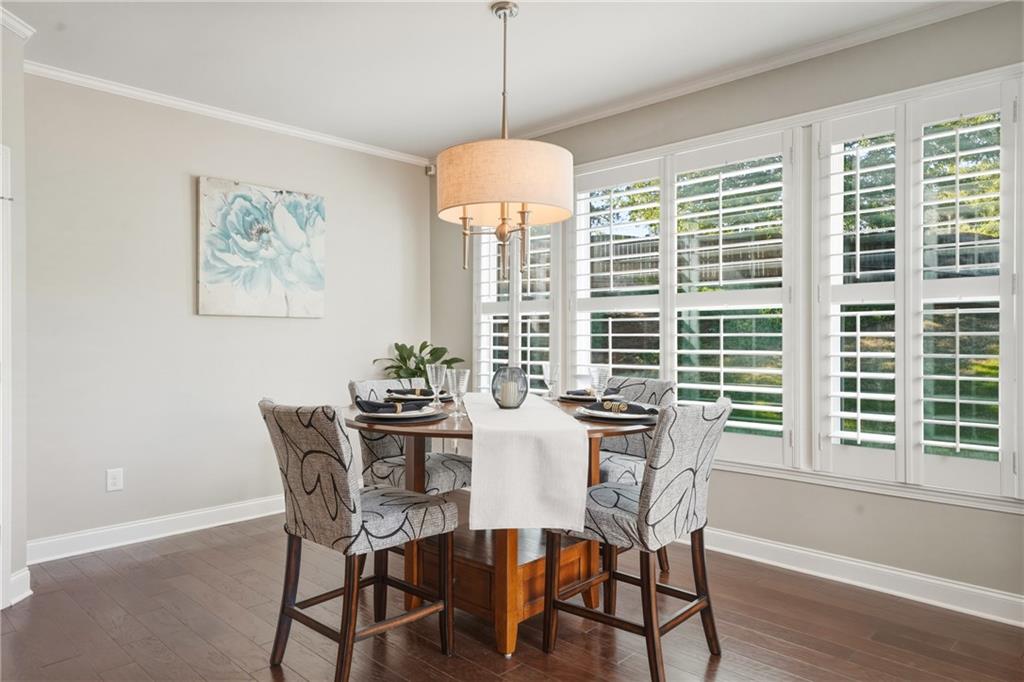 3330 Camelot Way Cumming, GA 30040 - Photo 15 of 47 a view of a dining room with furniture window and outside view