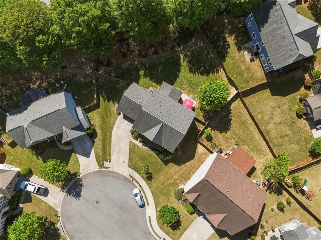 3330 Camelot Way Cumming, GA 30040 - Photo 43 of 47 an aerial view of a house with garden space and street view