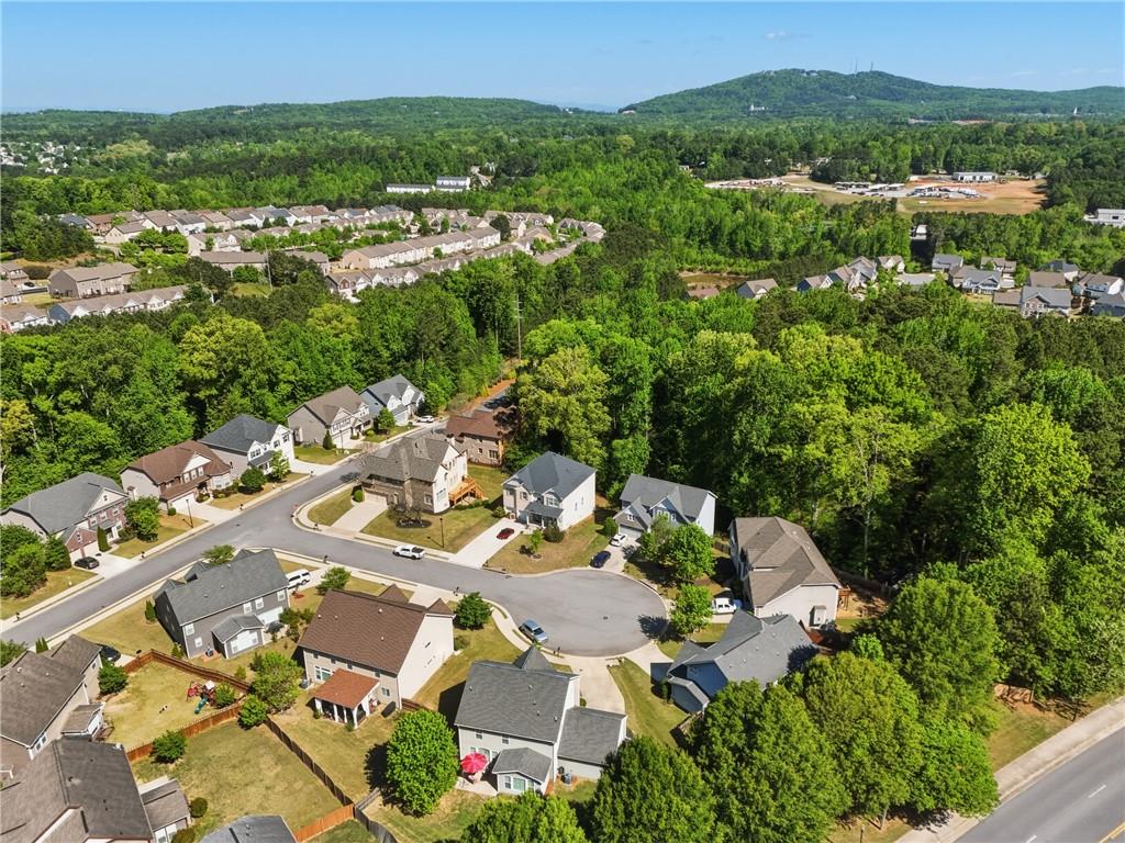 3330 Camelot Way Cumming, GA 30040 - Photo 44 of 47 an aerial view of a house with a yard