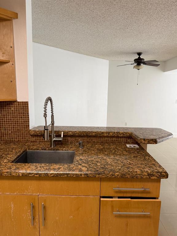6276 Northwest 186th Street, Unit 310 Hialeah, FL 33015 - Photo 14 of 21 a view of a sink with wooden floor