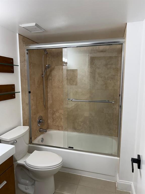6276 Northwest 186th Street, Unit 310 Hialeah, FL 33015 - Photo 9 of 21 a bathroom with a shower and a toilet