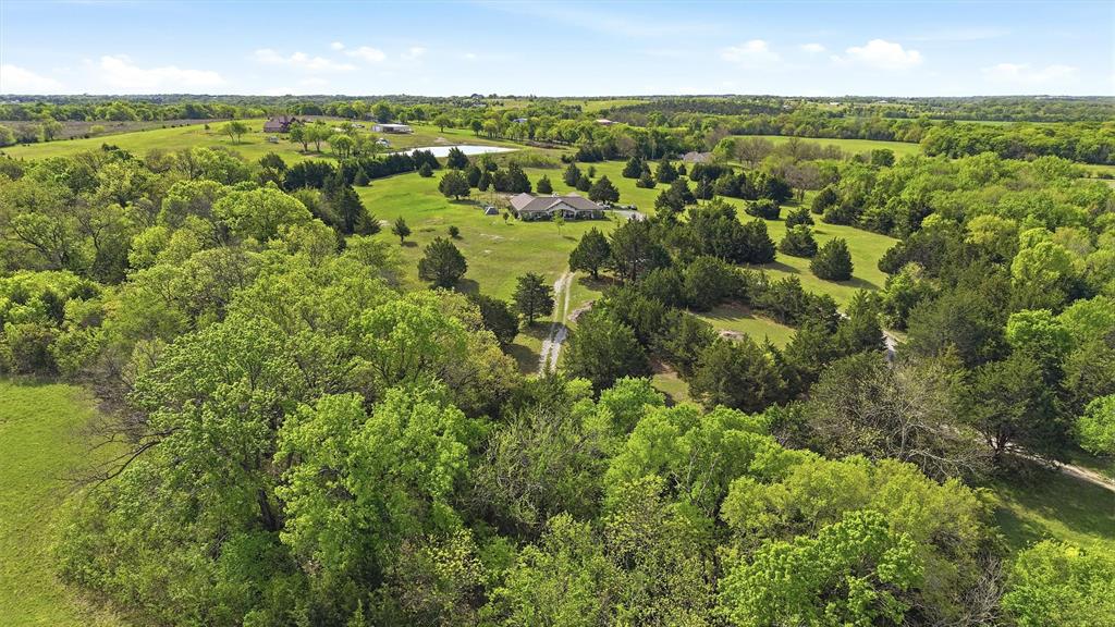 1959 Marlow Road Bells, TX 75414 - Photo 29 of 33 Bird's eye view of a heavily wooded area