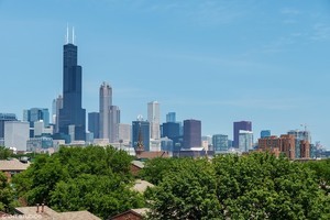 1069 West 14th Place, Unit 123 Chicago, IL 60608 - Photo 19 of 20 a view of a city with tall buildings