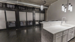 1069 West 14th Place, Unit 123 Chicago, IL 60608 - Photo 5 of 20 a kitchen with a sink and a refrigerator