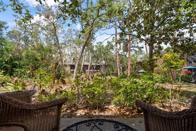a garden view with a seating space