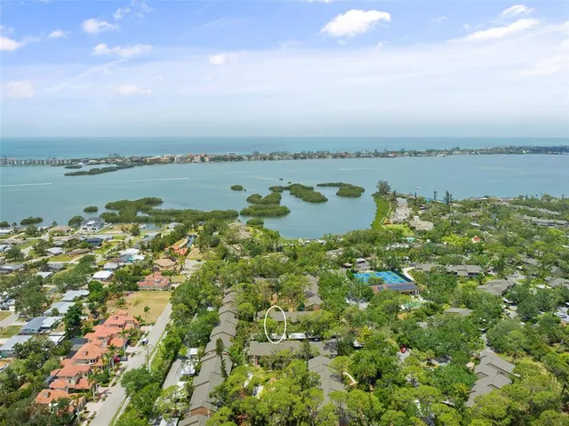 a aerial view of a houses with ocean view