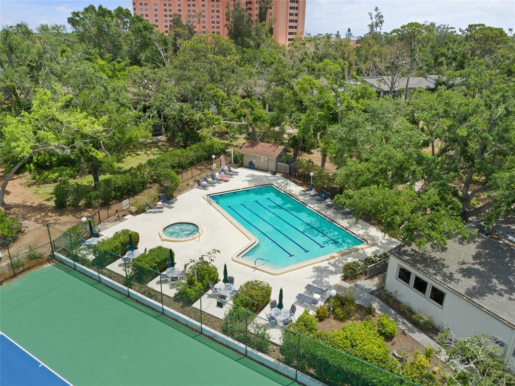 1703 Pelican Cove Road, Unit 356 Sarasota, FL 34231 - Photo 48 of 51 an aerial view of a backyard