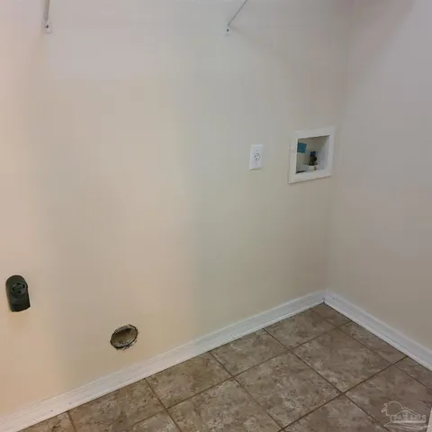 a view of a utility room with a window