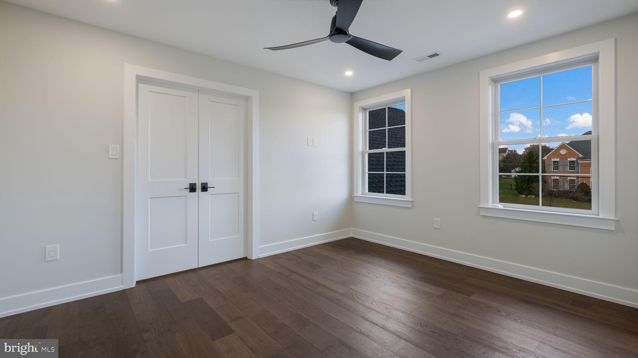 2550 Rickert Road Perkasie, PA 18944 - Photo 49 of 73 a view of an empty room with a window and wooden floor
