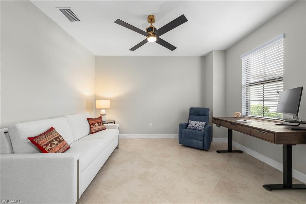 12692 Kinross Lane Naples, FL 34120 - Photo 25 of 47 Office or den featuring tile floors and a new fan