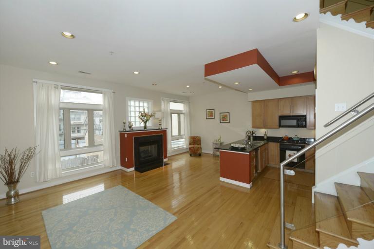2363 Champlain Street Northwest, Unit 25 Washington, DC 20009 - Photo 4 of 30 Living Room to Kitchen/Dining Area