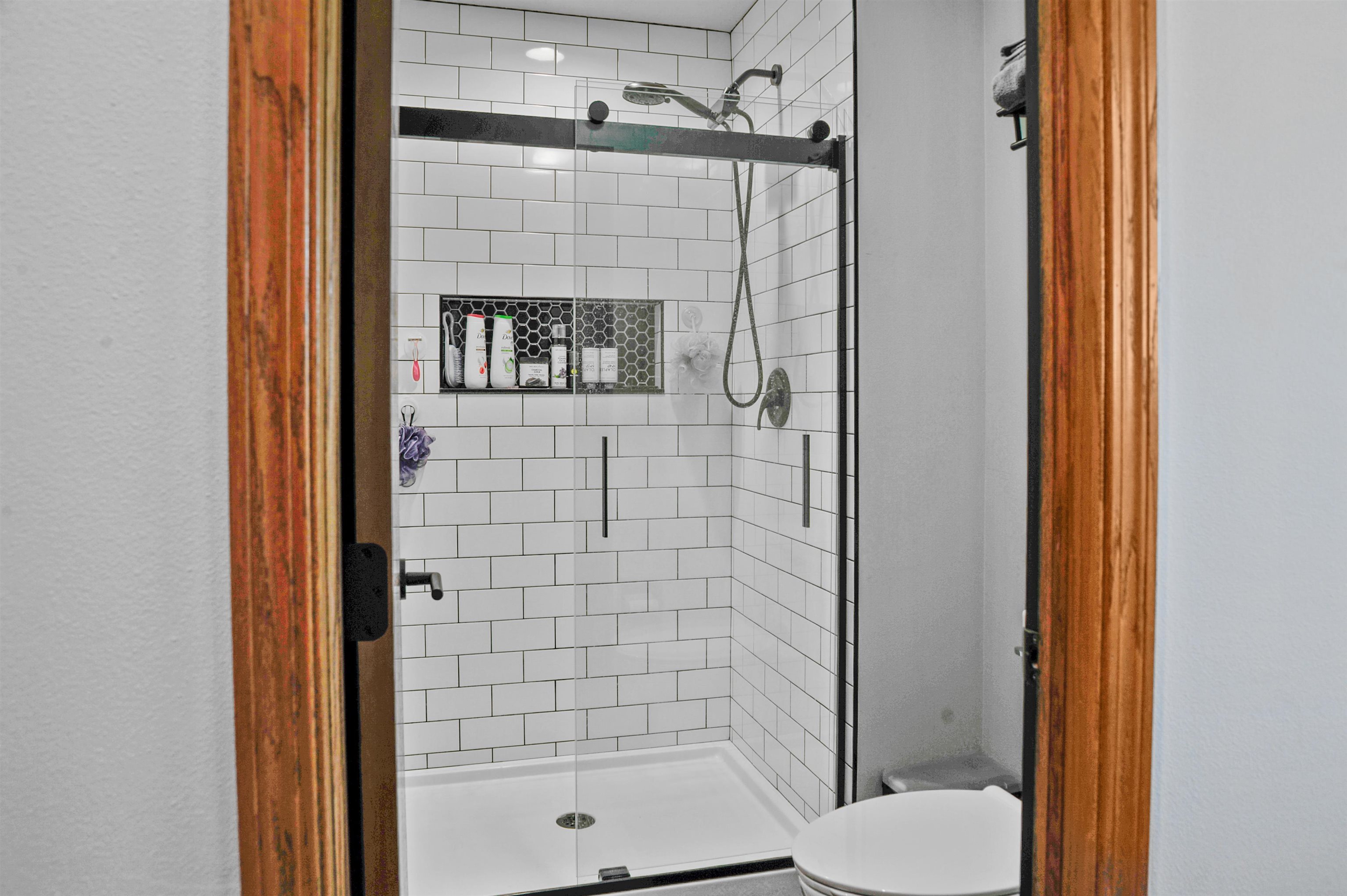 6442 Old Hunters Run Rockford, IL 61114 - Photo 24 of 38 a bathroom with a shower and toilet