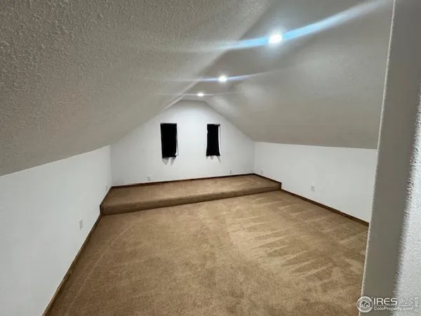 en empty room with windows