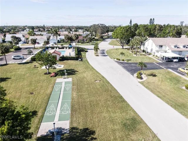 a view of a swimming pool with a lake view