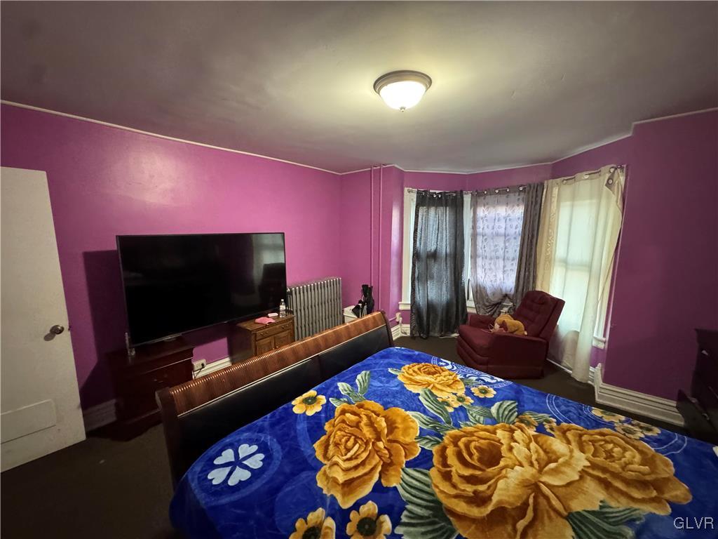 824 North 5th Street Allentown, PA 18102 - Photo 22 of 48 a living room with furniture and a flat screen tv