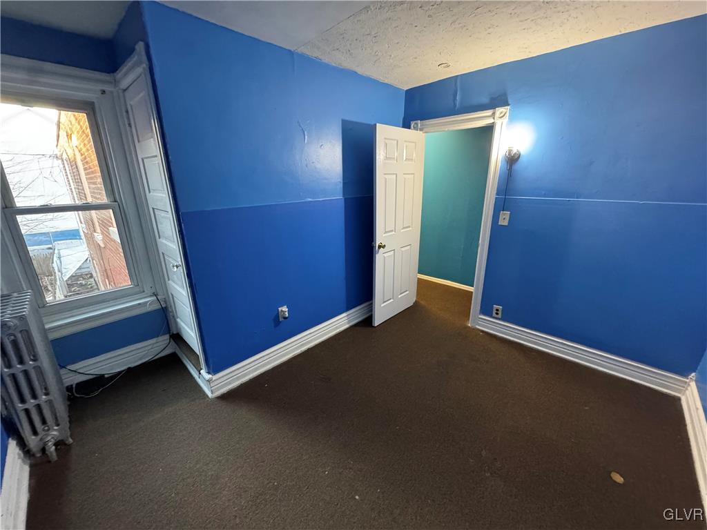 824 North 5th Street Allentown, PA 18102 - Photo 25 of 48 a view of an empty room with a window