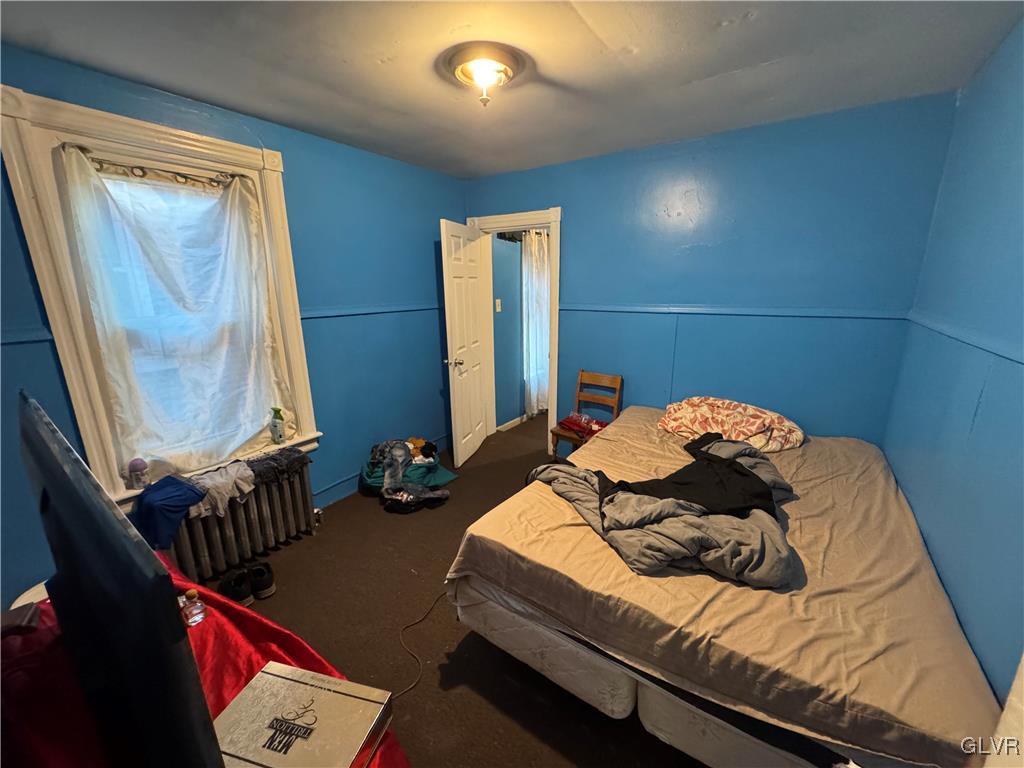 824 North 5th Street Allentown, PA 18102 - Photo 30 of 48 a bedroom with bed and balcony