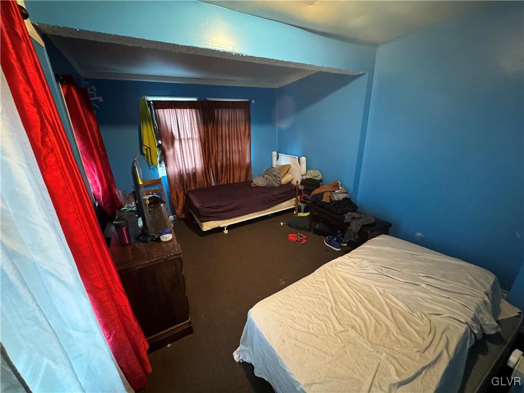 824 North 5th Street Allentown, PA 18102 - Photo 32 of 48 a bed room with a bed and a window