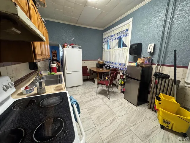 a room with furniture and a flat screen tv