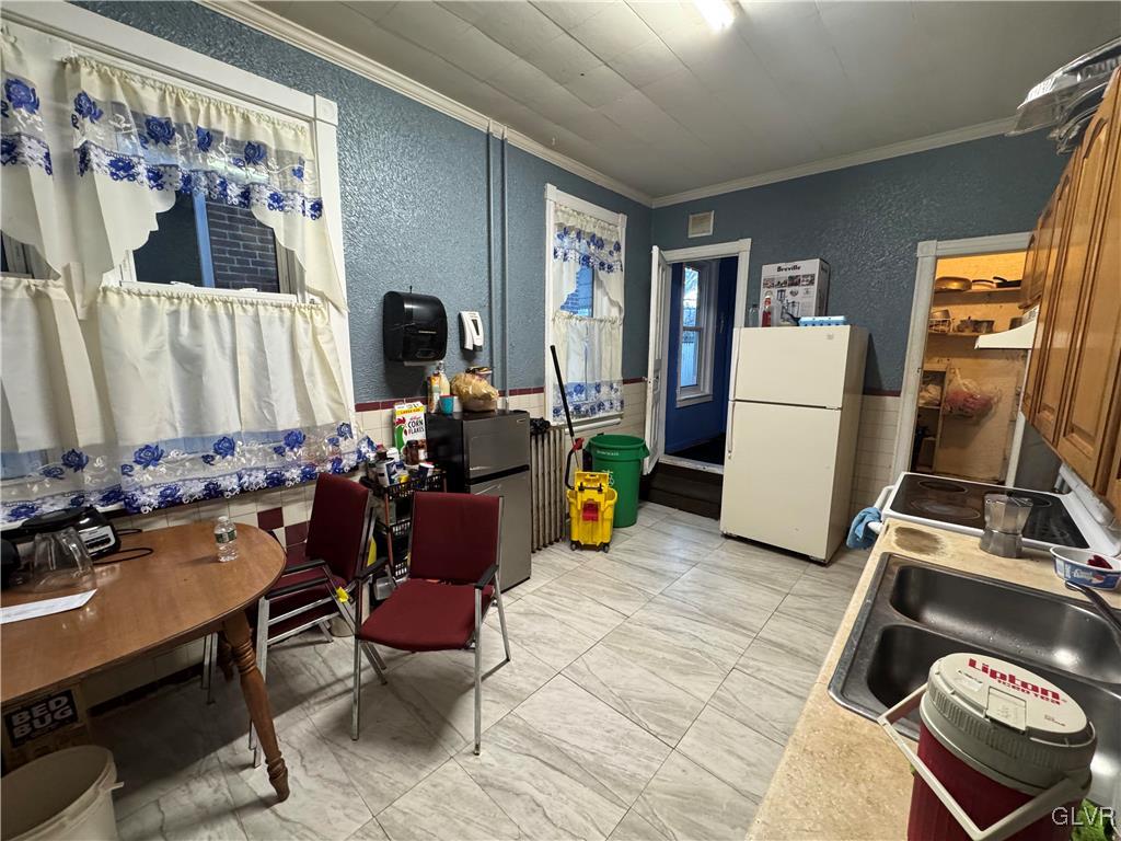 824 North 5th Street Allentown, PA 18102 - Photo 7 of 48 a room with furniture a rug and a window