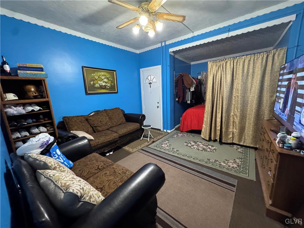 824 North 5th Street Allentown, PA 18102 - Photo 8 of 48 a living room with furniture and a flat screen tv