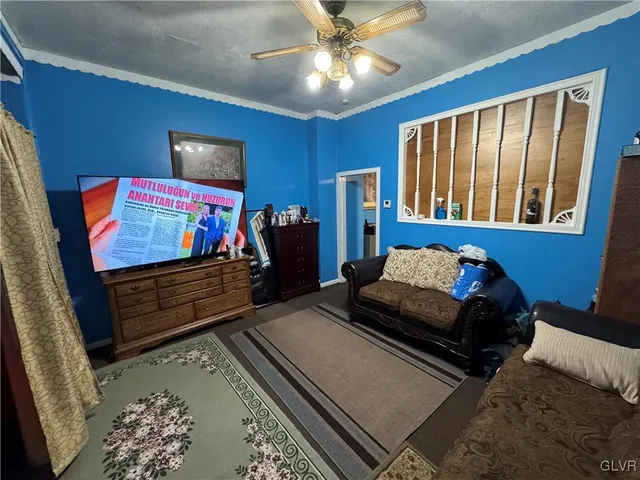 a bed room with furniture and a window