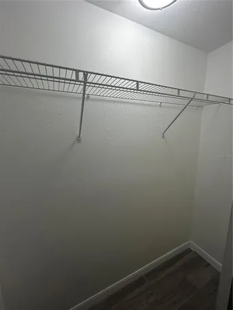 a view of a room with racks on the wall