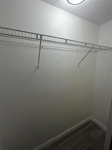 a view of a room with racks on the wall