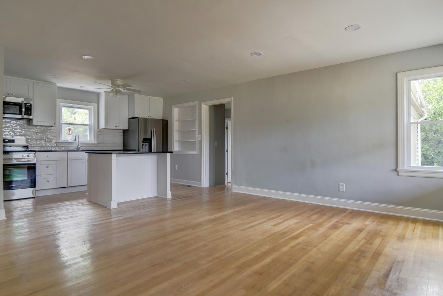 4724 Old Boonsboro Road Lynchburg, VA 24503 - Photo 17 of 39 a view of kitchen with wooden floor and a window