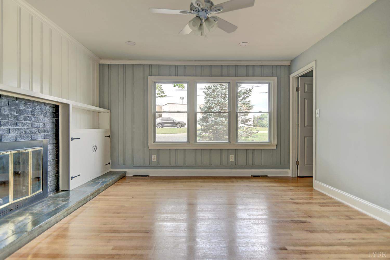 4724 Old Boonsboro Road Lynchburg, VA 24503 - Photo 20 of 39 a view of livingroom with window hardwood floor and cabinet