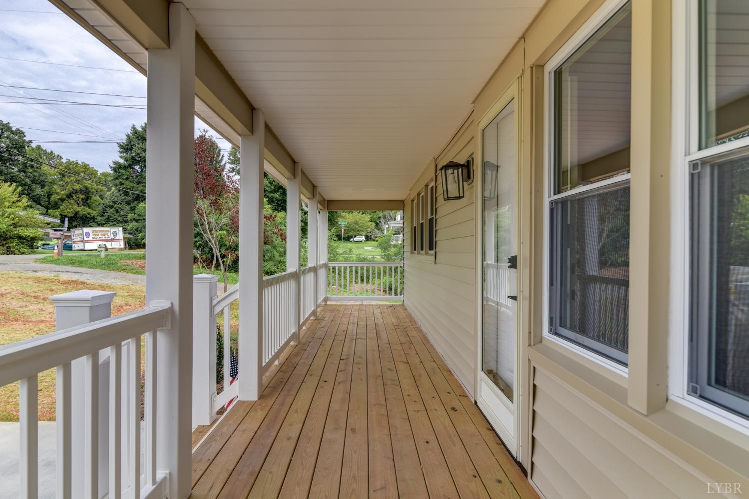 4724 Old Boonsboro Road Lynchburg, VA 24503 - Photo 2 of 39 a view of a balcony with wooden floor