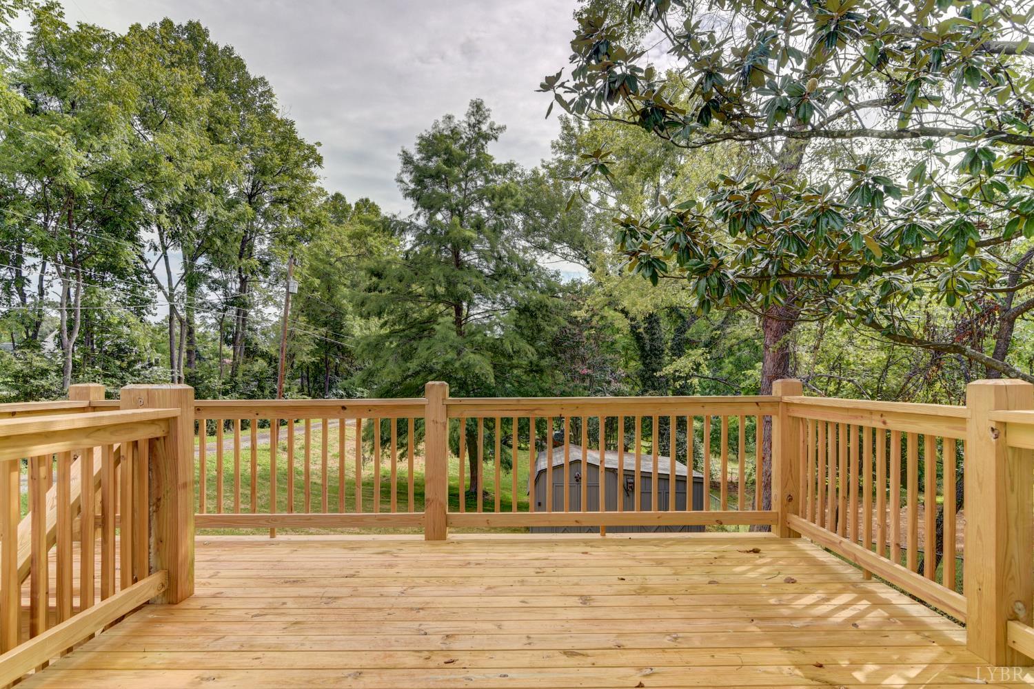 4724 Old Boonsboro Road Lynchburg, VA 24503 - Photo 27 of 39 a view of balcony with wooden floor and fence