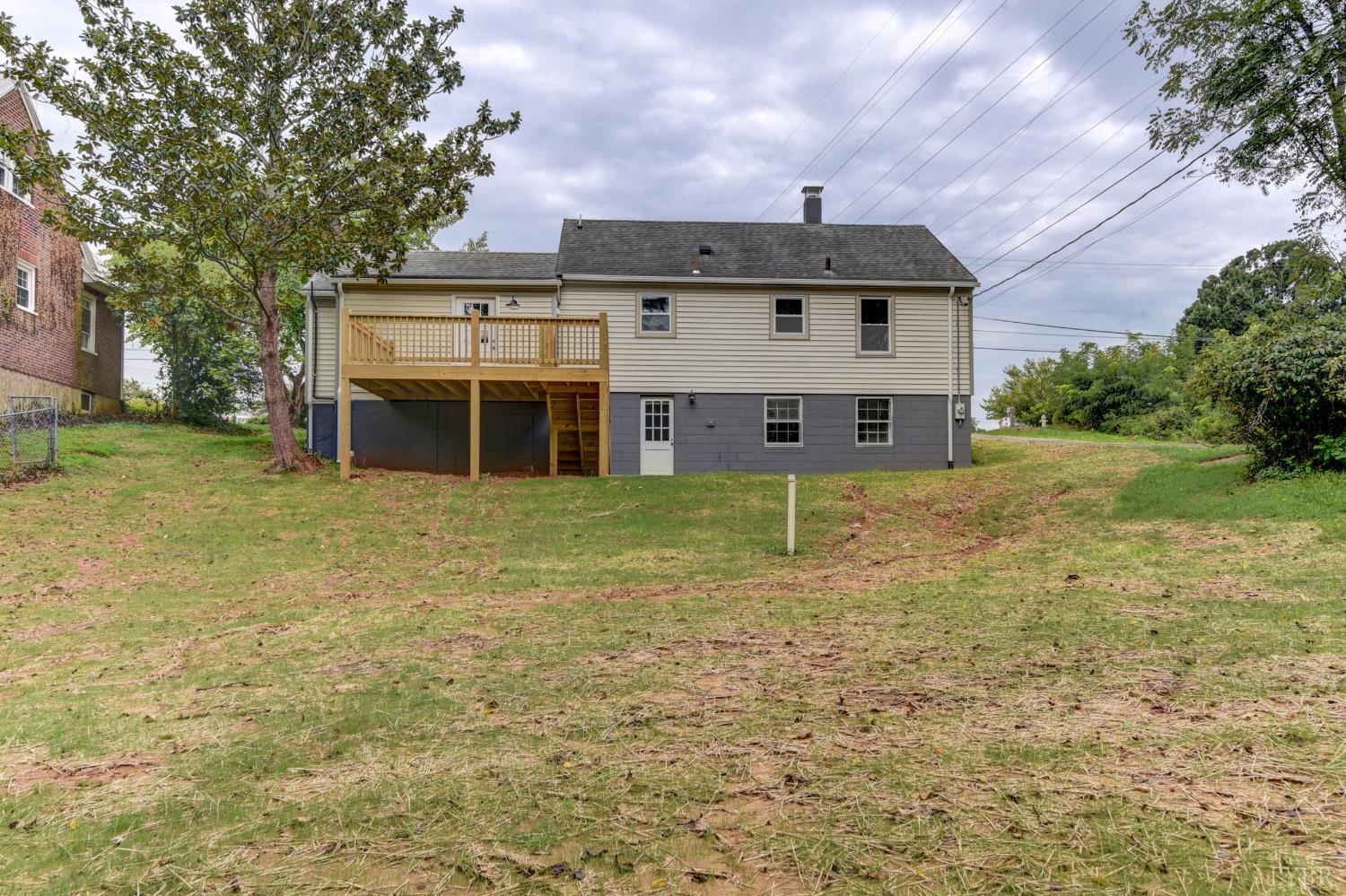4724 Old Boonsboro Road Lynchburg, VA 24503 - Photo 33 of 39 a view of a house with a yard and sitting area