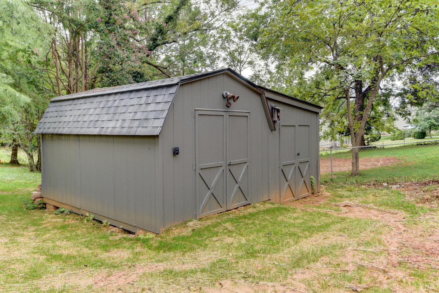 4724 Old Boonsboro Road Lynchburg, VA 24503 - Photo 34 of 39 a house with green field in front of it