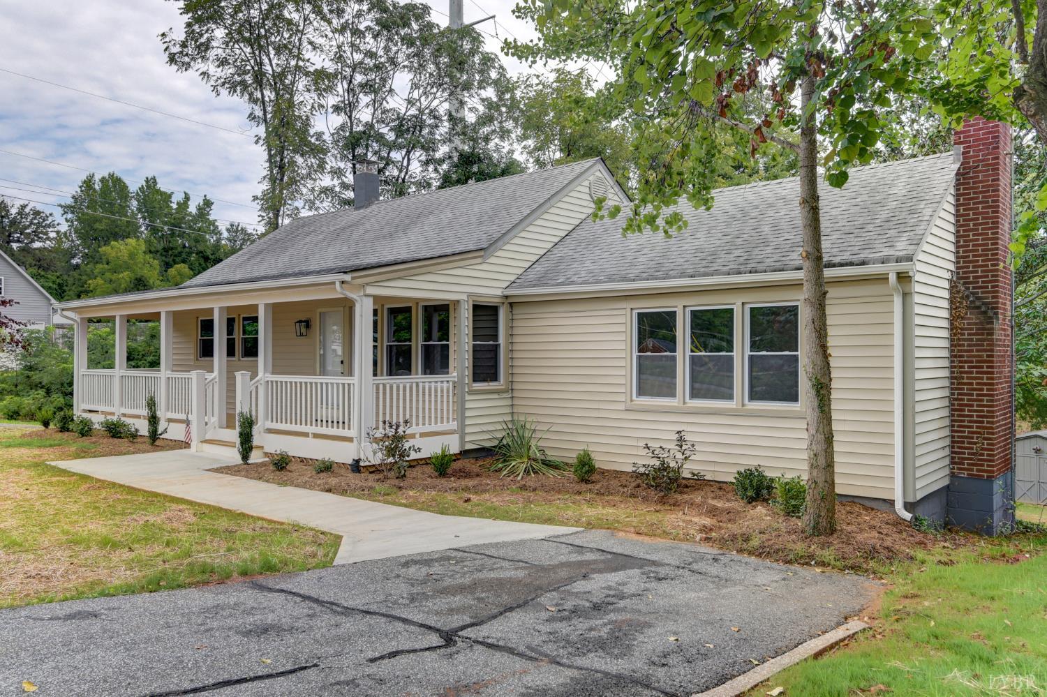 4724 Old Boonsboro Road Lynchburg, VA 24503 - Photo 35 of 39 a house that has a tree in front of it