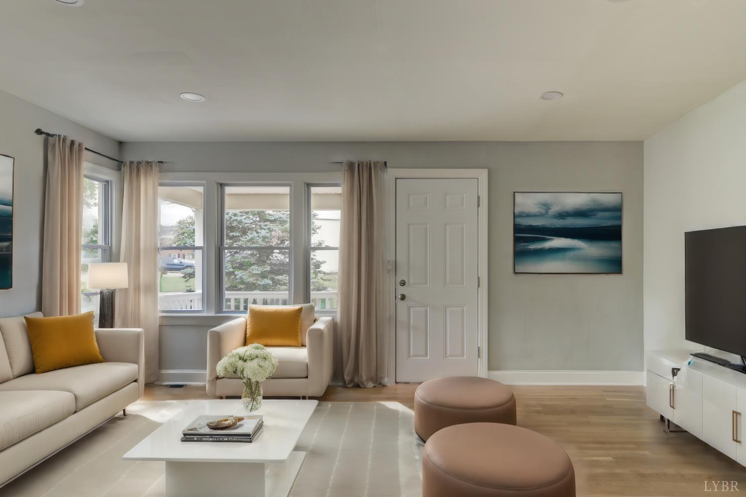 4724 Old Boonsboro Road Lynchburg, VA 24503 - Photo 36 of 39 a living room with furniture and a flat screen tv
