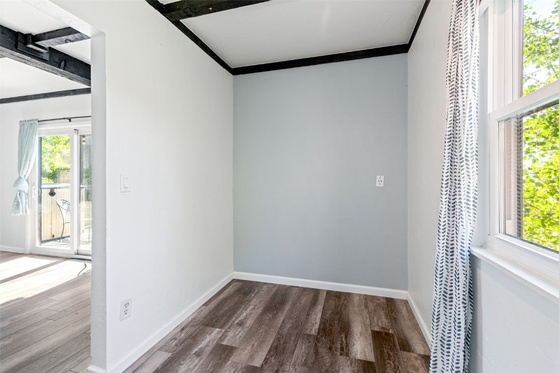 8011 Ryan Gulch Road, Unit B2 Silverthorne, CO 80498 - Photo 19 of 27 an empty room with windows