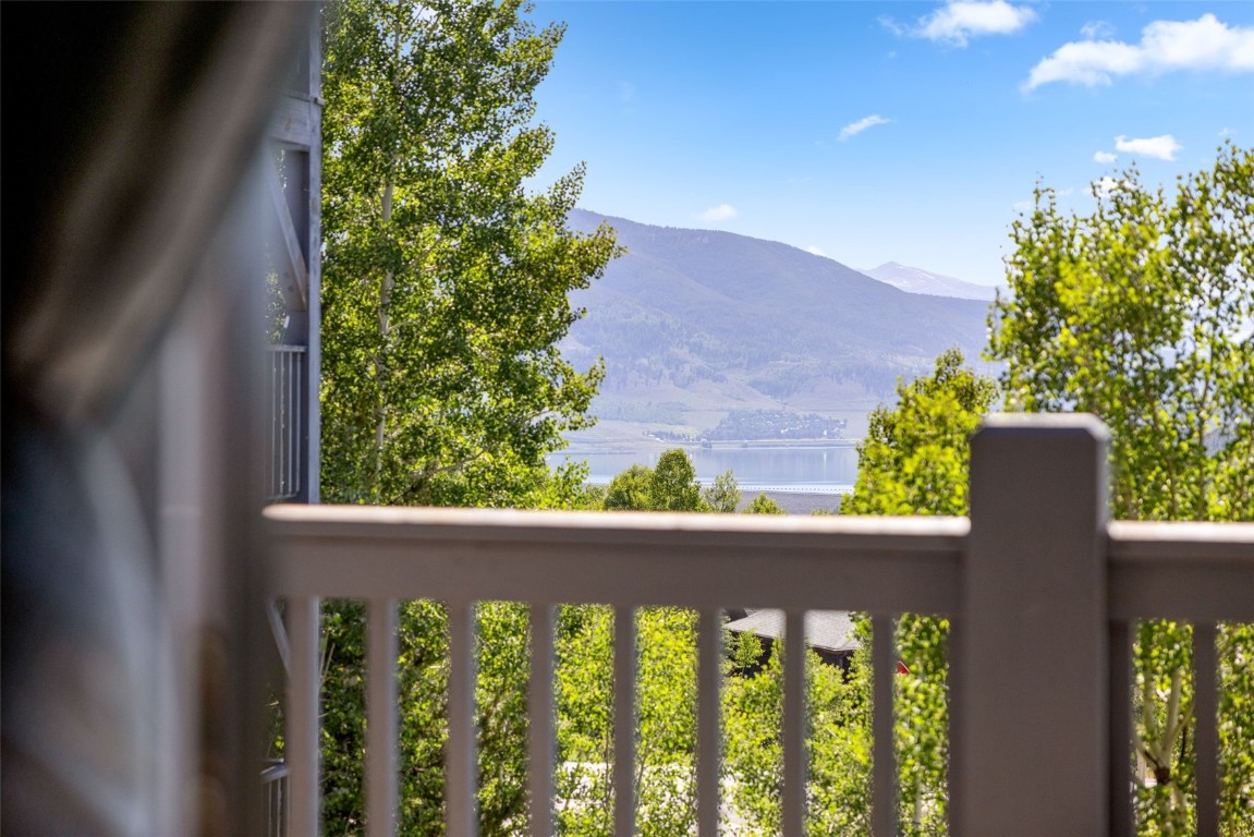 8011 Ryan Gulch Road, Unit B2 Silverthorne, CO 80498 - Photo 25 of 27 a view of a small yard from a balcony