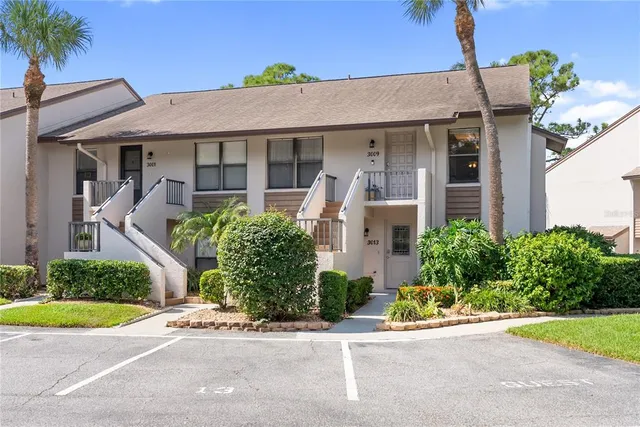a view of a livingroom with furniture and a fireplace