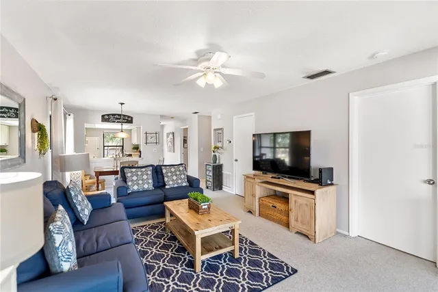 a kitchen with a sink cabinets and appliances