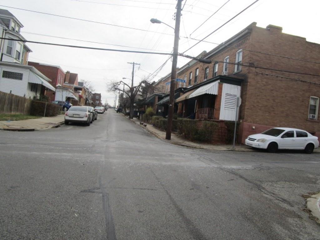 769 Anaheim Street Pittsburgh, PA 15219 - Photo 5 of 6 a view of a car parked in front of a house