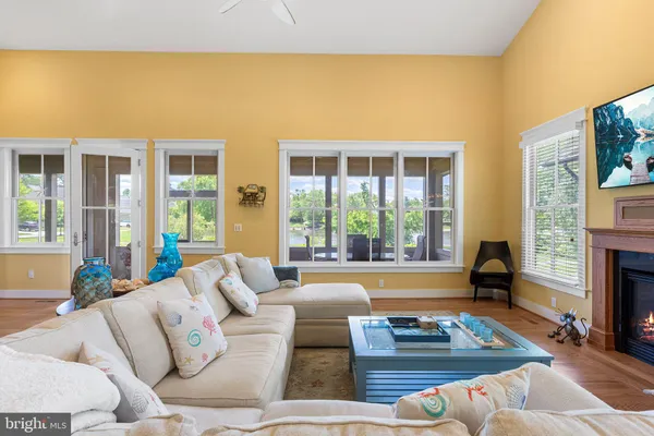 a kitchen with stainless steel appliances granite countertop a refrigerator a sink a stove and island