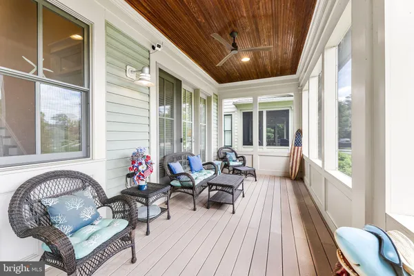 a bathroom with a sink vanity granite and a mirror