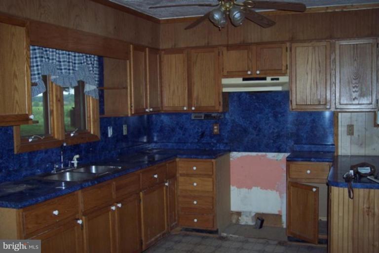 425 Bucher John Road Union Bridge, MD 21791 - Photo 3 of 6 a kitchen with a sink and cabinets
