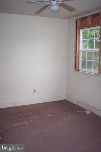 425 Bucher John Road Union Bridge, MD 21791 - Photo 5 of 6 an empty room with a window