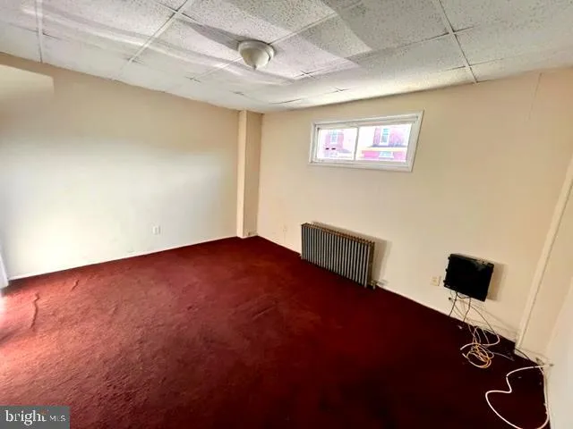 a kitchen with stainless steel appliances a stove a sink and a refrigerator