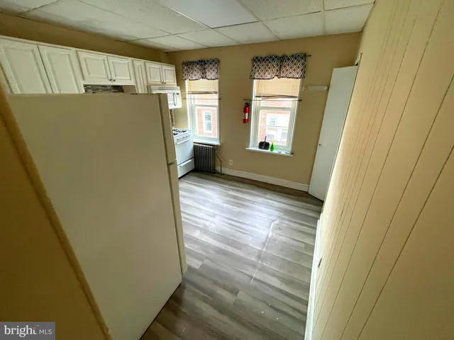 a kitchen with a stove and a microwave